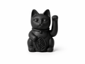 Black cat-shaped figurine with a round body on a white background